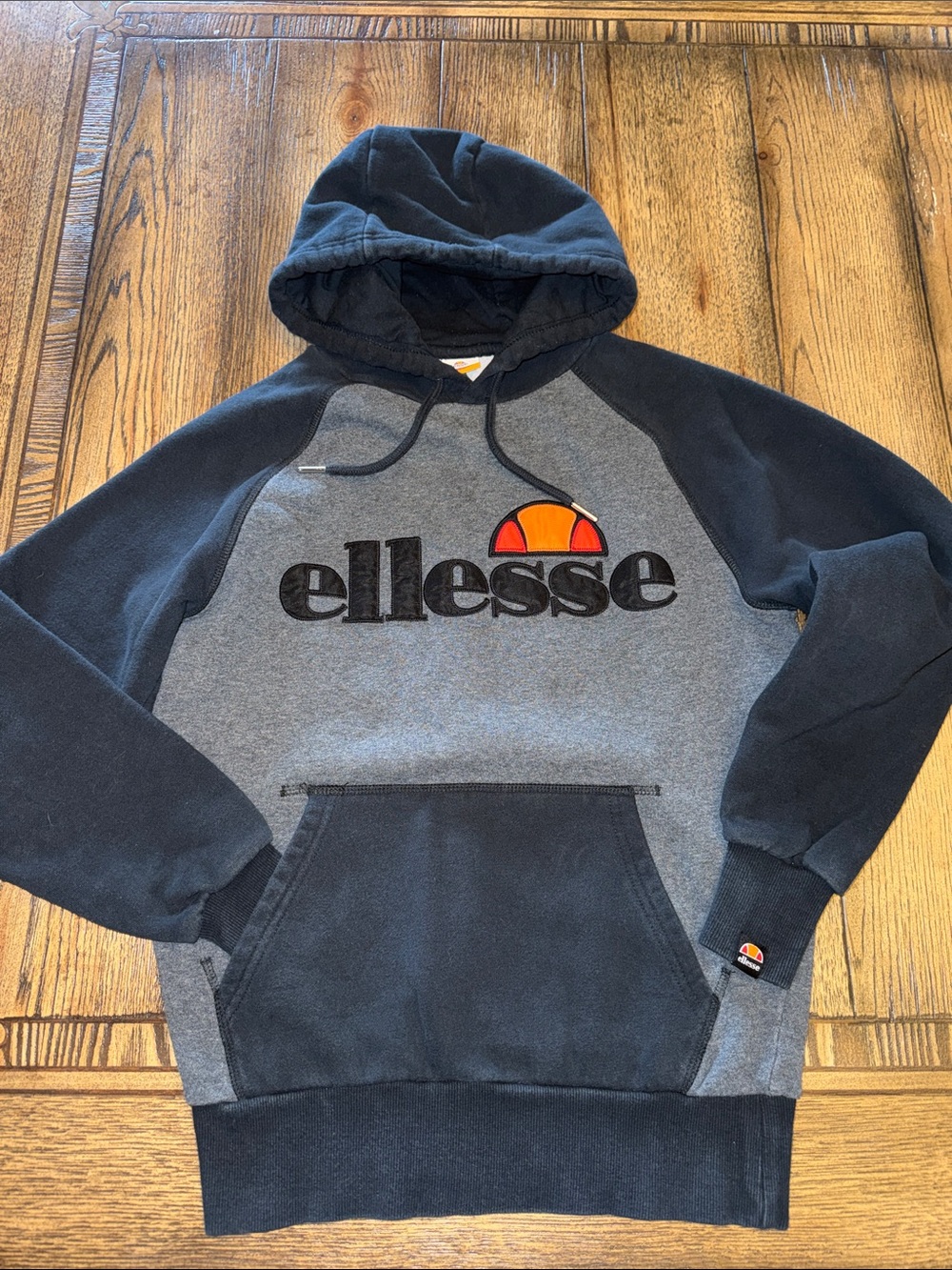 Ellesse Taliamento OH Hoodie in Black and Gray with Orange Accent